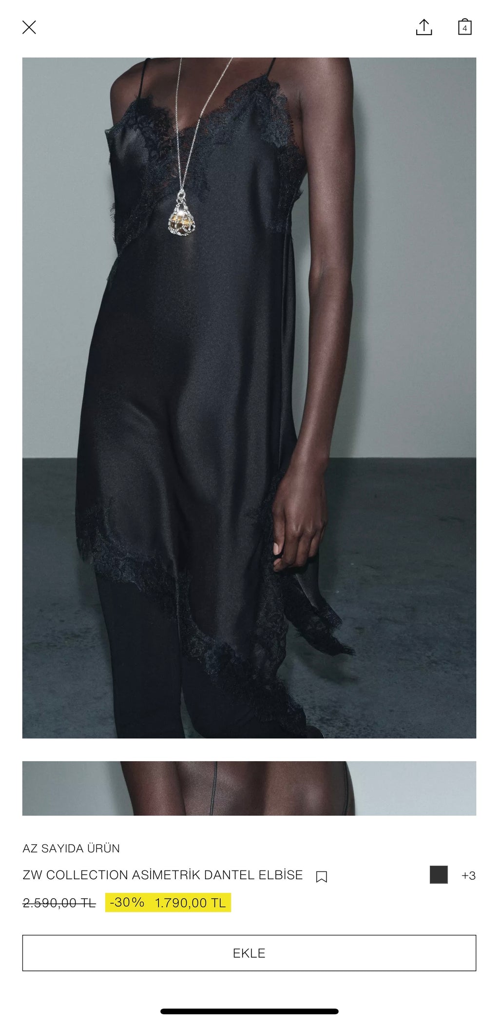 Asimetrik siyah dantel elbise