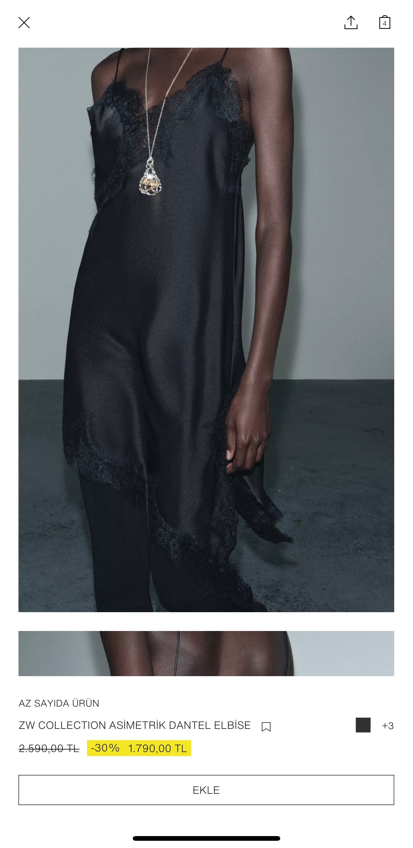 Asimetrik siyah dantel elbise