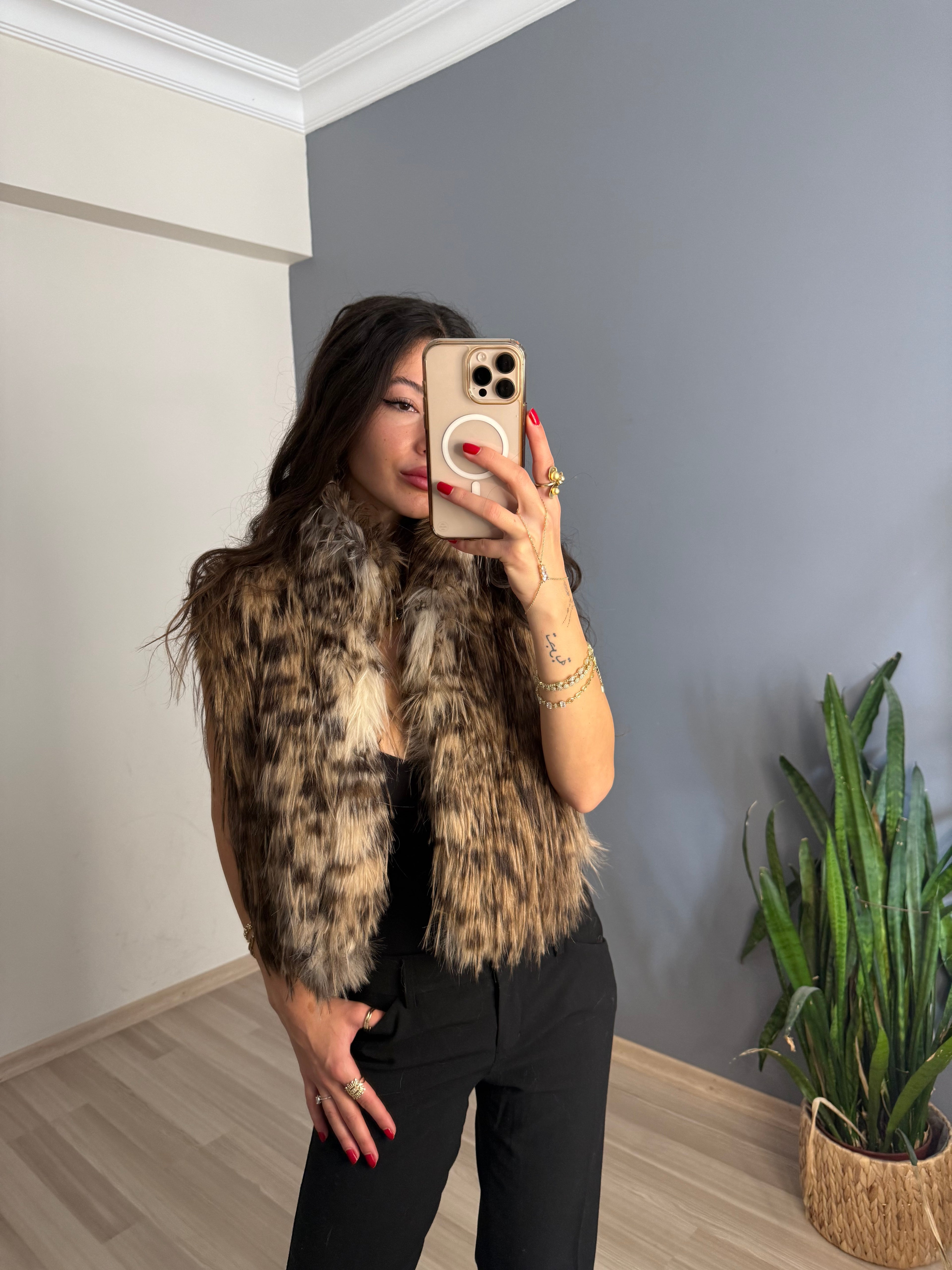 Hayvan desenli kürk yelek