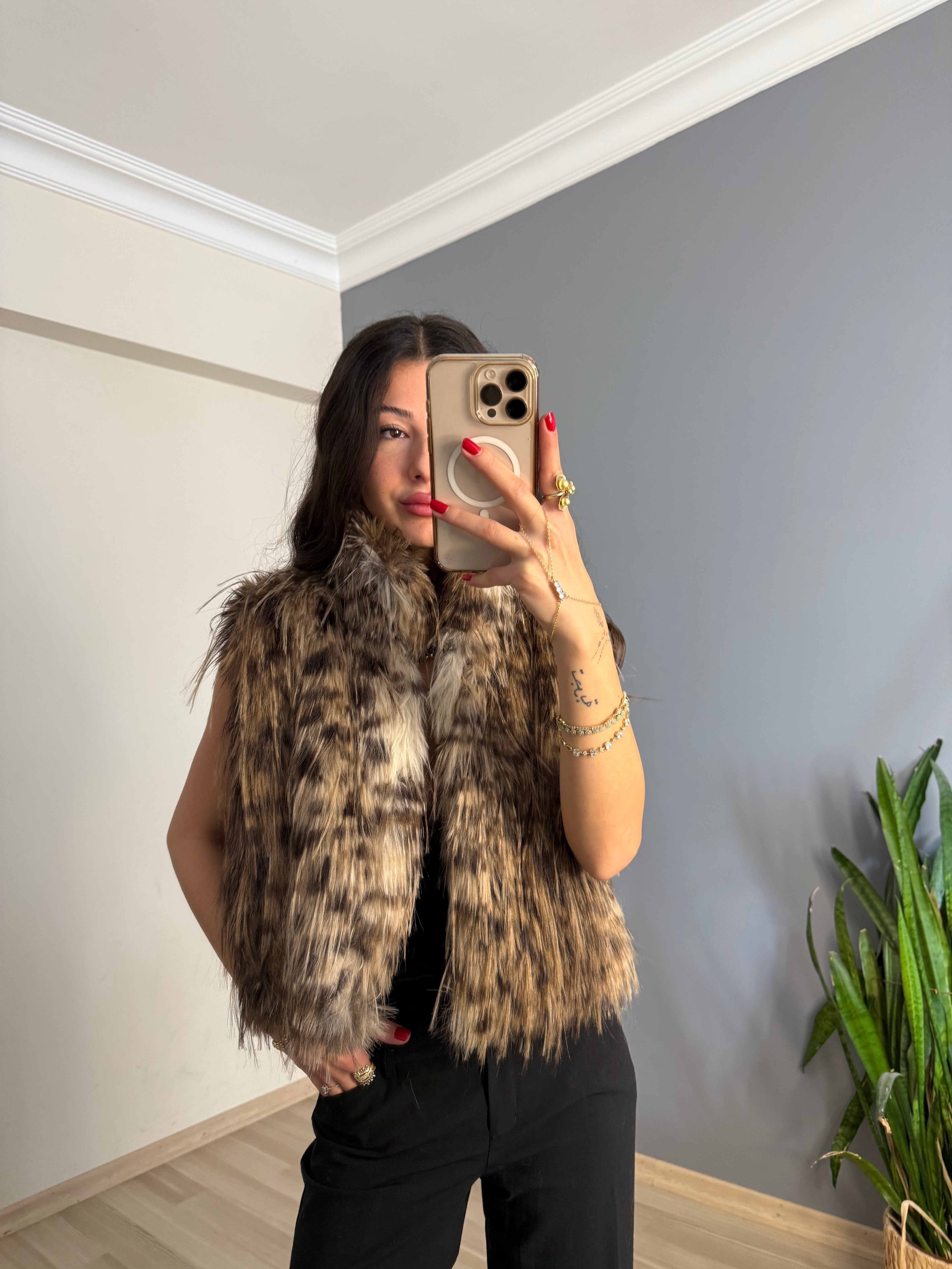 Hayvan desenli kürk yelek